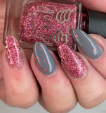 Better Not Pout - a dark grey crelly with three sizes of dusty pink holo glitter