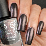 Stefan - a dark brown linear holo with shimmer