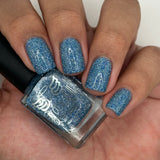 Ice Cave - a steel blue packed with reflective glitter and sapphire holo glitter