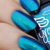 Frozen tundra - deep turquoise-blue base with a sprinkling of chrome chameleon and holo flakes