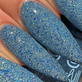 Ice Cave - a steel blue packed with reflective glitter and sapphire holo glitter