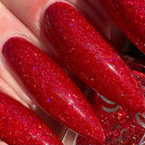 Candy Cane Lane - a red jelly base packed with red micro holo shreds and gold holo glitter.
