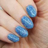 Ice Cave - a steel blue packed with reflective glitter and sapphire holo glitter