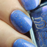 Prancer - a periwinkle base with a purple flash, and a sprinkling of gold metallic and chrome chameleon flakes