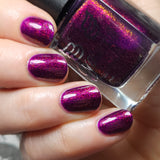 We Three Kings - a purple base with Aurora shimmer that gives a nice deep pink finish