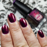 We Three Kings - a purple base with Aurora shimmer that gives a nice deep pink finish