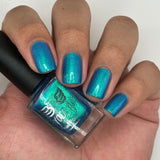 Frozen tundra - deep turquoise-blue base with a sprinkling of chrome chameleon and holo flakes