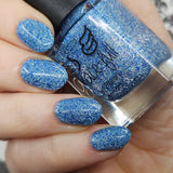 Ice Cave - a steel blue packed with reflective glitter and sapphire holo glitter