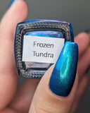 Frozen tundra - deep turquoise-blue base with a sprinkling of chrome chameleon and holo flakes