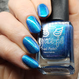 Frozen tundra - deep turquoise-blue base with a sprinkling of chrome chameleon and holo flakes