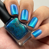 Frozen tundra - deep turquoise-blue base with a sprinkling of chrome chameleon and holo flakes