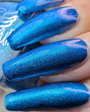 Frozen tundra - deep turquoise-blue base with a sprinkling of chrome chameleon and holo flakes