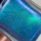 Frozen tundra - deep turquoise-blue base with a sprinkling of chrome chameleon and holo flakes