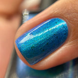 Frozen tundra - deep turquoise-blue base with a sprinkling of chrome chameleon and holo flakes