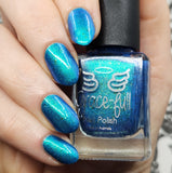 Frozen tundra - deep turquoise-blue base with a sprinkling of chrome chameleon and holo flakes