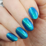 Frozen tundra - deep turquoise-blue base with a sprinkling of chrome chameleon and holo flakes