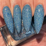 Ice Cave - a steel blue packed with reflective glitter and sapphire holo glitter