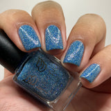 Ice Cave - a steel blue packed with reflective glitter and sapphire holo glitter