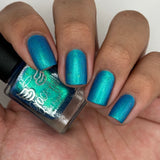 Frozen tundra - deep turquoise-blue base with a sprinkling of chrome chameleon and holo flakes