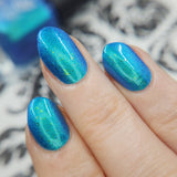 Frozen tundra - deep turquoise-blue base with a sprinkling of chrome chameleon and holo flakes