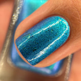 Frozen tundra - deep turquoise-blue base with a sprinkling of chrome chameleon and holo flakes