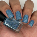 Ice Cave - a steel blue packed with reflective glitter and sapphire holo glitter