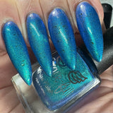 Frozen tundra - deep turquoise-blue base with a sprinkling of chrome chameleon and holo flakes