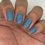 Ice Cave - a steel blue packed with reflective glitter and sapphire holo glitter