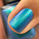 Frozen tundra - deep turquoise-blue base with a sprinkling of chrome chameleon and holo flakes