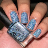 Ice Cave - a steel blue packed with reflective glitter and sapphire holo glitter