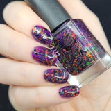 Ghouls and Boo’s  A purple jelly with green and orange metallic glitter and black matte glitter