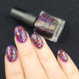 Ghouls and Boo’s  A purple jelly with green and orange metallic glitter and black matte glitter