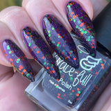 Ghouls and Boo’s  A purple jelly with green and orange metallic glitter and black matte glitter