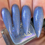 Prancer - a periwinkle base with a purple flash, and a sprinkling of gold metallic and chrome chameleon flakes