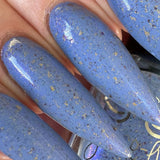 Prancer - a periwinkle base with a purple flash, and a sprinkling of gold metallic and chrome chameleon flakes