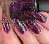 Ghouls and Boo’s  A purple jelly with green and orange metallic glitter and black matte glitter