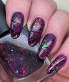 Ghouls and Boo’s  A purple jelly with green and orange metallic glitter and black matte glitter