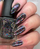 Own the Night - with a black jelly base it is packed full of multi coloured colour shifting flakes.