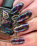 Own the Night - with a black jelly base it is packed full of multi coloured colour shifting flakes.