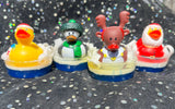 Christmas Rubber Duckies in a soap pond 24