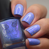 Prancer - a periwinkle base with a purple flash, and a sprinkling of gold metallic and chrome chameleon flakes