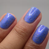 Prancer - a periwinkle base with a purple flash, and a sprinkling of gold metallic and chrome chameleon flakes