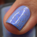 Prancer - a periwinkle base with a purple flash, and a sprinkling of gold metallic and chrome chameleon flakes