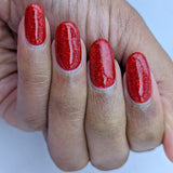 Cosmic entity a red based jelly with metallic red flakes, holo and metallic glitters
