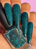 Flight of fancy - a deep green base with reflective holo glitter and three sizes of sea green holo glitter