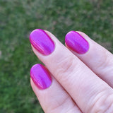 Infinite force is a stunning Aurora shimmer in a vibrant pink/purple