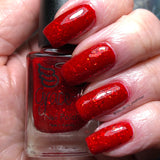 Cosmic entity a red based jelly with metallic red flakes, holo and metallic glitters