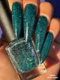 Flight of fancy - a deep green base with reflective holo glitter and three sizes of sea green holo glitter