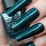 Evergreen Envy – a jelly teal coloured base with a smattering of holo flakes