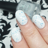 Snow Day  -  a white based crelly with blue holo flakes and teeny silver holo flakes